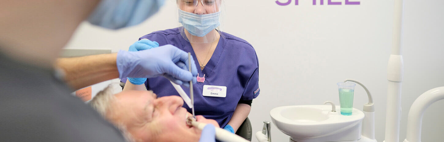 A patient going through an oral hygiene consultation