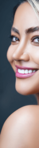 Woman turning around with Invisalign treatment smiling in Stourbridge